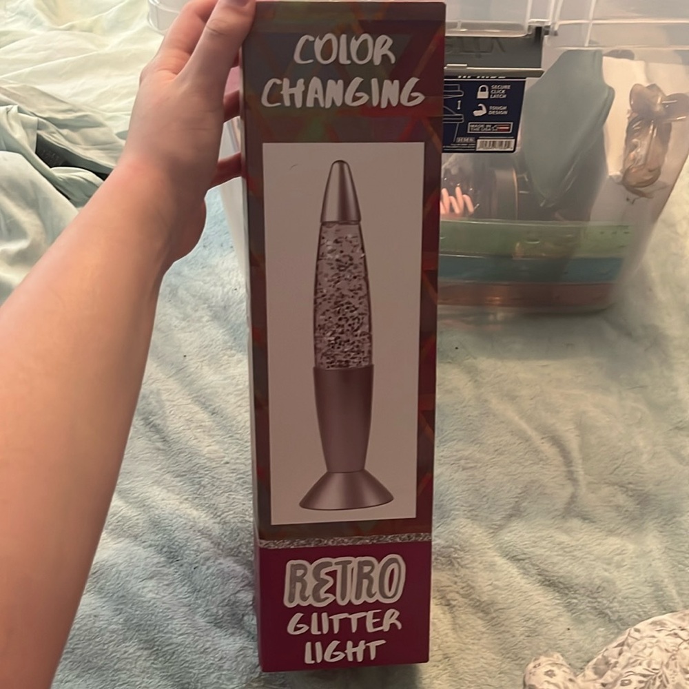This super cute lava lamp was never used or even taken out of the box.